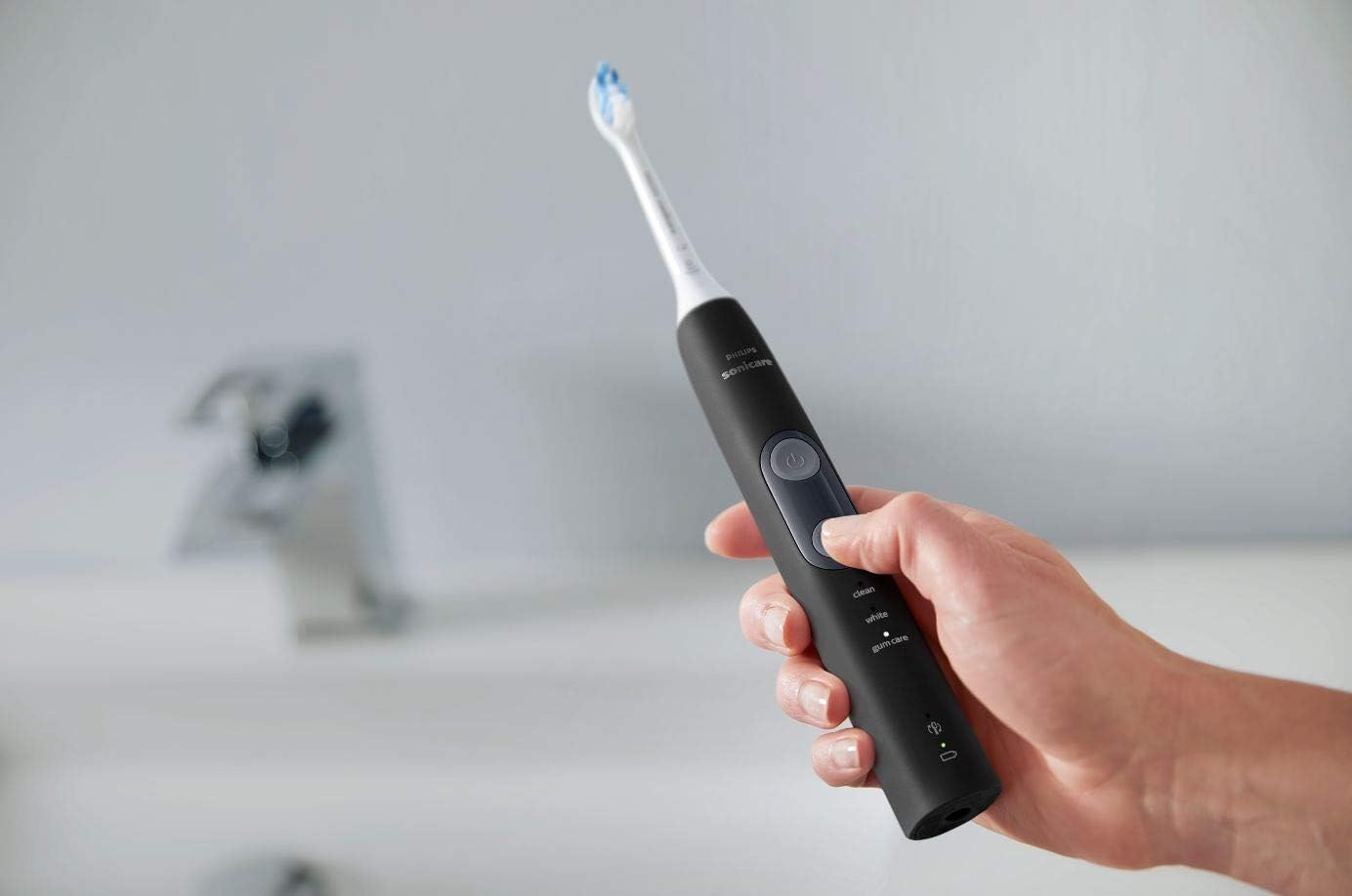 Philips Sonicare ProtectiveClean 5300 Rechargeable Electric Toothbrush, with Pressure Sensor, 3 Cleaning Modes, SmarTimer and QuadPacer, with 2 Bonus Brush Heads, Travel Case, Black, Model HX6423/34 - Image 2